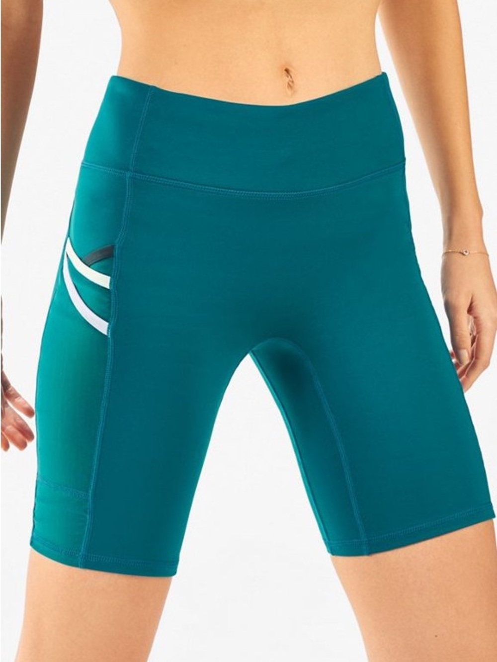 Fabletics Trinity Mid Rise Pocket Biker Shorts in Azure/Green Mist $59.95